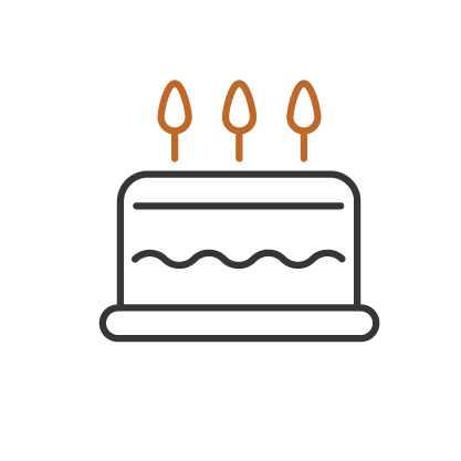 Icon of a birthday cake with three candles